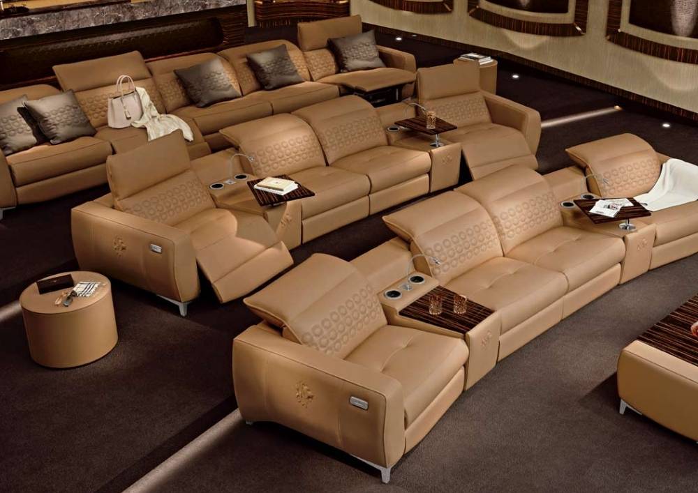 San Marco cinema seating — tiered leather recliners with side tables in a luxury home theatre