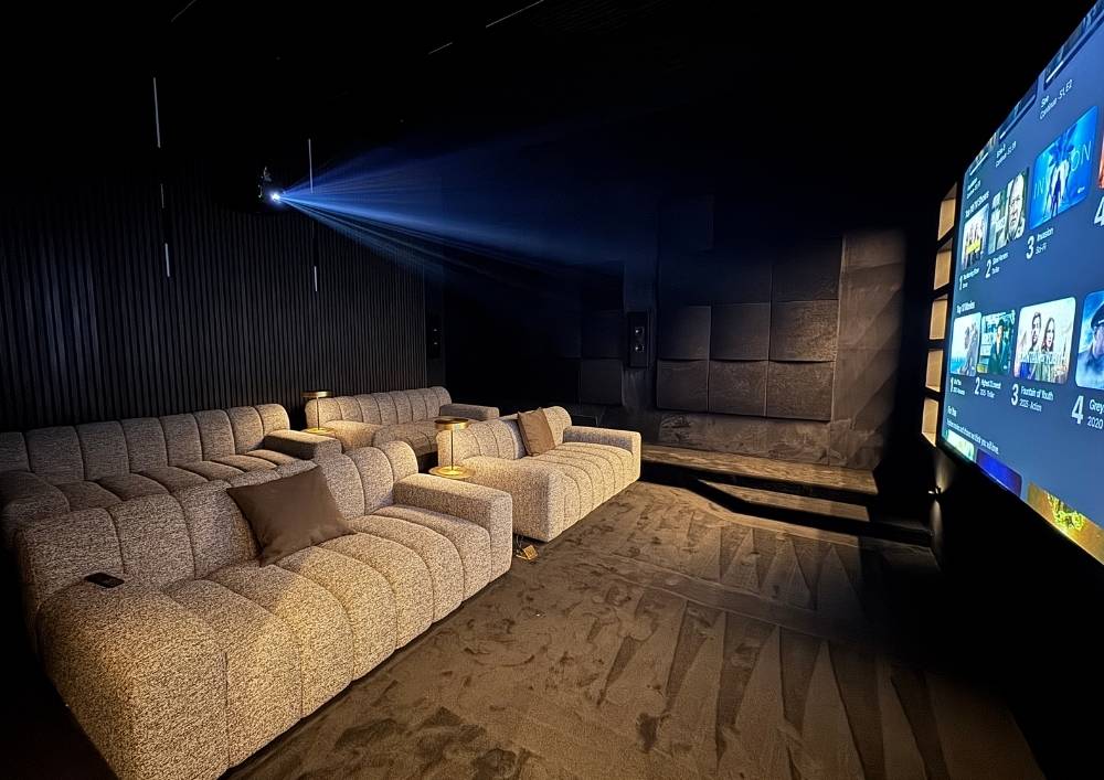 Home cinema media room in Dubai with concealed acoustic treatment